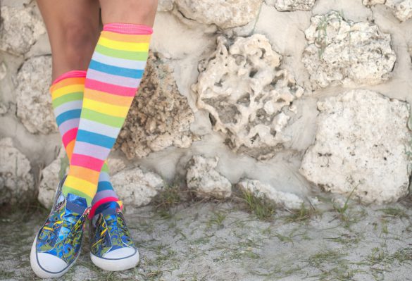 colourful canvas shoes with colourful striped knee high socks
