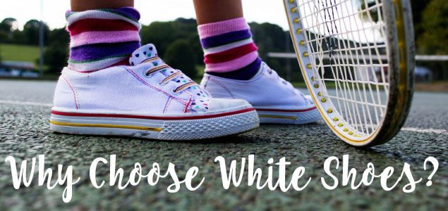 white canvas shoe with colourful laces and socks